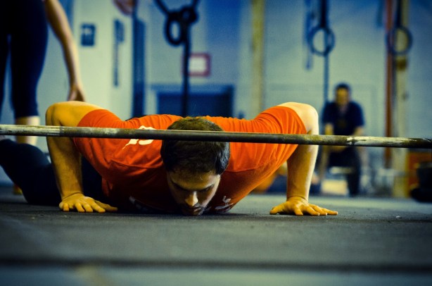 crossfit bar facing burpees